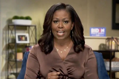 This image grab made on August 17, 2020 from the online broadcast of the Democratic National Convention, being held virtually amid the novel coronavirus pandemic, shows former First Lady Michelle Obama speaking during the opening night of the convention. - Americas political convention season begins tonight with former first lady Michelle Obama addressing the Democrats now-virtual gathering set to anoint Joe Biden, as President Donald Trump defies coronavirus concerns to rally supporters in battleground Wisconsin. (Photo by - / DEMOCRATIC NATIONAL CONVENTION / AFP) / RESTRICTED TO EDITORIAL USE - MANDATORY CREDIT AFP PHOTO / DEMOCRATIC NATIONAL CONVENTION  - NO MARKETING - NO ADVERTISING CAMPAIGNS - DISTRIBUTED AS A SERVICE TO CLIENTS
