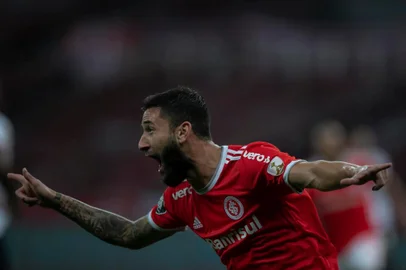  Brazils Internacional midfielder Gabriel Boschilia celebrates after scoring against Colombias America de Cali during their closed-door Copa Libertadores group phase football match at the Beira Rio stadium in Porto Alegre, Brazil, on September 16, 2020, amid the COVID-19 novel coronavirus pandemic. (Photo by Liamara POLLI / POOL / AFP)Editoria: SPOLocal: Porto AlegreIndexador: LIAMARA POLLISecao: soccerFonte: POOLFotógrafo: STR<!-- NICAID(14593938) -->