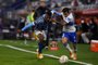  Brazils Gremio defender, Colombian Luis Orejuela (L) and Chiles Universidad Catolica midfielder Edson Puch vie for the ball during their closed-door Copa Libertadores group phase football match at the Estadio San Carlos de Apoquindo stadium in Santiago, on September 16, 2020, amid the COVID-19 novel coronavirus pandemic. (Photo by ELVIS GONZALEZ / POOL / AFP)Editoria: SPOLocal: SantiagoIndexador: ELVIS GONZALEZSecao: soccerFonte: POOLFotógrafo: STR<!-- NICAID(14594232) -->
