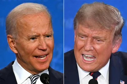 (COMBO) This combination of pictures created on September 29, 2020 shows Democratic Presidential candidate and former US Vice President Joe Biden (L) and US President Donald Trump speaking during the first presidential debate at the Case Western Reserve University and Cleveland Clinic in Cleveland, Ohio on September 29, 2020.US President Donald Trump speaks during the first presidential debate at Case Western Reserve University and Cleveland Clinic in Cleveland, Ohio, on September 29, 2020. (Photos by JIM WATSON and SAUL LOEB / AFP)<!-- NICAID(14605031) -->