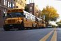  School buses are seen parked in the Brooklyn neighborhood of Borough Park on October 6, 2020 in New York City. - New York will temporarily close schools in nine neighborhoods experiencing an uptick in coronavirus infections, Governor Andrew Cuomo announced on October 5, 2020, highlighting the difficulty of keeping children in classrooms during the pandemic. The public and private schools are in areas of Brooklyn and Queens, where the rate of positive cases has been above the three percent threshold for more than seven days. (Photo by Angela Weiss / AFP)Editoria: EDULocal: New YorkIndexador: ANGELA WEISSSecao: teaching and learningFonte: AFPFotógrafo: STF<!-- NICAID(14610290) -->