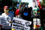  People take part in demonstration to protest against the government of President Jair Bolsonaro and against racism and and in solidarity with the Black Lives Matter movement on the esplanade of ministries in Brasilia, Brazil on June 7, 2020. (Photo by Sergio LIMA / AFP)Editoria: POLLocal: BrasíliaIndexador: SERGIO LIMASecao: racismFonte: AFPFotógrafo: STR<!-- NICAID(14517050) -->