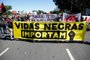  People take part in demonstration to protest against the government of President Jair Bolsonaro and against racism and and in solidarity with the Black Lives Matter movement on the esplanade of ministries in Brasilia, Brazil on June 7, 2020. (Photo by Sergio LIMA / AFP)Editoria: POLLocal: BrasíliaIndexador: SERGIO LIMASecao: racismFonte: AFPFotógrafo: STR<!-- NICAID(14517041) -->