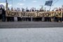  PORTO ALEGRE, RS, BRASIL, 20/11/2020- Um protesto em frente ao Carrefour do bairro Passo D¿areia reuniu em torno de 40 manifestantes, no fim da manhã desta sexta-feira (20). Faixas e cartazes relembravam a morte de João Alberto Silveira Freitas, de 40 anos, espancado e asfixiado no estacionamento do supermercado. Foto: Marco Favero \ Agencia RBS.<!-- NICAID(14649318) -->