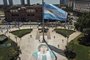  Aerial view of the Argentinian flag at half mast at Mayo sqaure next to a drawing on the pavement as people queue along Avenida de Mayo avenue to reach the Casa Rosada presidential palace to pay tribute to late Argentine football legend Diego Maradona in Buenos Aires in November 26, 2020. - Argentine football legend Diego Maradona will be buried Thursday on the outskirts of Buenos Aires, a spokesman said. Maradona, who died of a heart attack Wednesday at the age of 60, will be laid to rest in the Jardin de Paz cemetery, where his parents were also buried, Sebastian Sanchi told AFP. (Photo by Ivan PISARENKO / AFP)Editoria: SPOLocal: Buenos AiresIndexador: IVAN PISARENKOSecao: soccerFonte: AFPFotógrafo: STF<!-- NICAID(14653405) -->