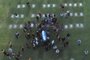  Aerial view of the burrial of late Argentine football legend Diego Armando Maradona as his family and friens carry the coffin with his remains at the Jardin Bella Vista cemetery, in Buenos Aires province, on November 26, 2020. - Argentine football legend Diego Maradona -who died of a heart attack on the eve, at the age of 60- will be laid to rest where his parents have been buried. (Photo by Emiliano LASALVIA / AFP)Editoria: SPOLocal: Bella VistaIndexador: EMILIANO LASALVIASecao: soccerFonte: AFPFotógrafo: STR<!-- NICAID(14653826) -->