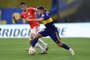  Brazils Internacional Bruno Praxedes (L) and Argentinas Boca Juniors Julio Buffarini vie for the ball during their closed-door Copa Libertadores round before the quarterfinals football match at La Bombonera stadium in Buenos Aires, on December 9, 2020. (Photo by Marcelo Endelli / POOL / AFP)Editoria: SPOLocal: Buenos AiresIndexador: MARCELO ENDELLISecao: soccerFonte: POOLFotógrafo: STR<!-- NICAID(14664974) -->