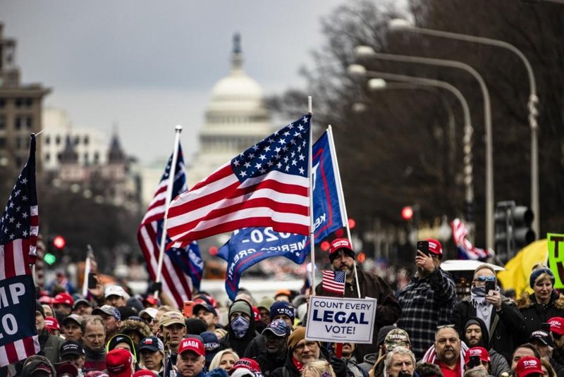 WASHINGTON, DC - JANUARY 05: Supporters of President Donald Trump gather in Freedom Plaza for a rally on January 5, 2021 in Washington, DC. Todays rally kicks off two days of pro-Trump events fueled by President Trumps continued claims of election fraud and a last ditch effort to overturn the results before Congress finalizes them on January 6.   Samuel Corum/Getty Images/AFP<!-- NICAID(14684223) -->