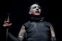 (FILES) In this file photo Marilyn Manson performs during the Astroworld Festival at NRG Stadium on November 9, 2019 in Houston, Texas - Westworld star Evan Rachel Wood on February 1, 2021 accused industrial rock icon Marilyn Manson of being a dangerous man who subjected her to years of abuse starting when she was a teenager.  The American actress, who began working in entertainment as a child, has in the past alleged abuse by an ex-partner whom she kept anonymous, but on Monday identified her abuser as Brian Warner, also known to the world as Marilyn Manson. (Photo by SUZANNE CORDEIRO / AFP)<!-- NICAID(14704416) -->
