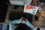 CAXIAS DO SUL, RS, BRASIL (21/06/2021)matéria de crimes cibernéticos. A ideia é uma foto da criança de costas em frente à tela do computador aberto em algum jogo ou alguma página da internet. (Antonio Valiente/Agência RBS)<!-- NICAID(14814281) -->