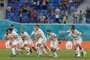 Spains players celebrate after winning during the UEFA EURO 2020 quarter-final football match between Switzerland and Spain at the Saint Petersburg Stadium in Saint Petersburg on July 2, 2021. (Photo by MAXIM SHEMETOV / POOL / AFP)Editoria: SPOLocal: Saint PetersburgIndexador: MAXIM SHEMETOVSecao: soccerFonte: POOLFotógrafo: STR<!-- NICAID(14824504) -->