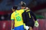 Soccer Football - Women - Quarterfinal - Canada v BrazilTokyo 2020 Olympics - Soccer Football - Women - Quarterfinal - Canada v Brazil - Miyagi Stadium, Miyagi, Japan - July 30, 2021. Marta of Brazil and Barbara of Brazil look dejected after the match REUTERS/Amr Abdallah DalshEditoria: SLocal: MIYAGIIndexador: AMR ABDALLAH DALSHFonte: X90179<!-- NICAID(14849607) -->