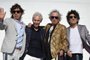 (FILES) In this file photo taken on February 15, 2016 The Rolling Stones (L-R) Mick Jagger, Charlie Watts, Keith Richards and Ron Wood, are pictured upon landing in Montevideo. - Charlie Watts, drummer with legendary British rocknroll band the Rolling Stones, died on August 24, 2021 aged 80, according to a statement from his publicist. (Photo by Pablo PORCIUNCULA / AFP)Editoria: ACELocal: MontevideoIndexador: PABLO PORCIUNCULASecao: musicFonte: AFPFotógrafo: STF<!-- NICAID(14870959) -->