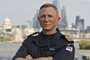 A handout photograph taken on September 22, 2021 and released by the Royal Navy, UK Ministry of Defence (MOD) on September 23, 2021, shows Commander Daniel Craig, who is best known for playing the role of James Bond in the long running 007 film series, on his receiving the honorary Royal Navy rank of Commander from the Head of the Royal Navy, First Sea Lord Admiral Sir Tony Radakin KCB ADC at the Corinthia Hotel in London. - James Bond actor Daniel Craig has been made an honorary commander in the Royal Navy, matching the rank of the fictional superspy he plays on screen, the service announced on Thursday. (Photo by Lee BLEASE / MOD / AFP) / RESTRICTED TO EDITORIAL USE - MANDATORY CREDIT   AFP PHOTO / LEE BLEASE / UK MOD / CROWN COPYRIGHT 2021   -  NO MARKETING NO ADVERTISING CAMPAIGNS   -   DISTRIBUTED AS A SERVICE TO CLIENTS  -  NO ARCHIVE - TO BE USED WITHIN 2 DAYS FROM SEPTEMBER 23, 2021 (48 HOURS), EXCEPT FOR MAGAZINES WHICH CAN PRINT THE PICTURE WHEN FIRST REPORTING ON THE EVENT / <!-- NICAID(14898454) -->