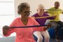 Senior woman exercising with resistance band in fitness studioFonte: 288148412<!-- NICAID(14903249) -->
