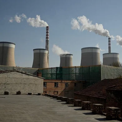 A coal-powered power station belches smoke in Datong, Chinas northern Shanxi province on November 4, 2021. (Photo by Noel Celis / AFP)<!-- NICAID(14936185) -->
