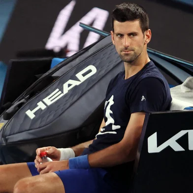 Novak Djokovic of Serbia attends a practice session ahead of the Australian Open tennis tournament in Melbourne on January 14, 2022. (Photo by MARTIN KEEP / AFP) / --IMAGE RESTRICTED TO EDITORIAL USE - NO COMMERCIAL USE--Editoria: SPOLocal: MelbourneIndexador: MARTIN KEEPSecao: tennisFonte: AFPFotógrafo: STF<!-- NICAID(14990430) -->