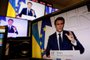 A picture of monitors taken in a media control room in Paris on March 2, 2022, shows French President Emmanuel Macron speaking from the Elysee Palace during a televised address on the general situation seven days after Russia launched a military invasion on Ukraine. (Photo by Ludovic MARIN / AFP)<!-- NICAID(15031646) -->