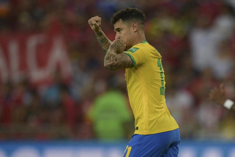 Brazils Philippe Coutinho celebrates after scoring against Chile during their South American qualification football match for the FIFA World Cup Qatar 2022, at Maracana Stadium in Rio de Janeiro, Brazil, on March 24, 2022. (Photo by CARL DE SOUZA / AFP)Editoria: SPOLocal: Rio de JaneiroIndexador: CARL DE SOUZASecao: soccerFonte: AFPFotógrafo: STF<!-- NICAID(15050747) -->