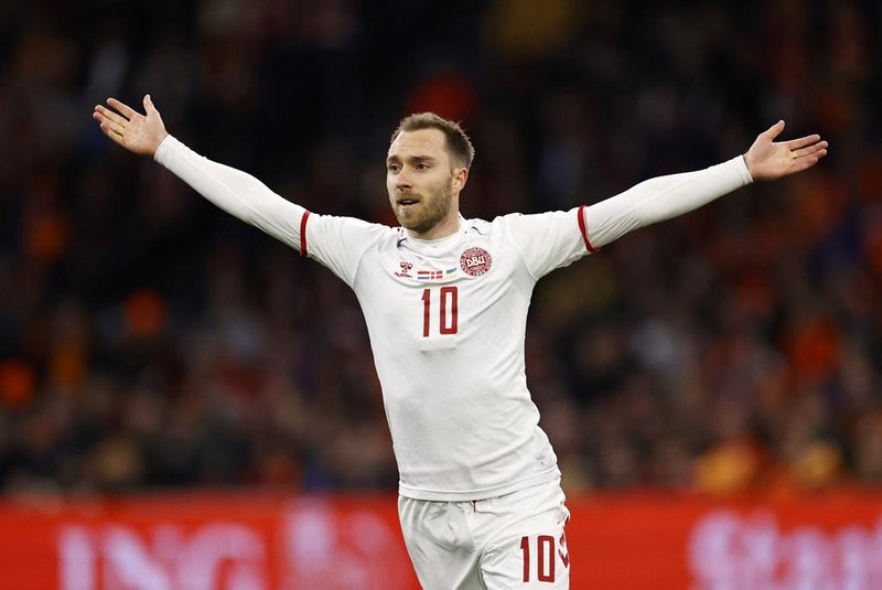 Denmarks Christian Eriksen celebrates after scoring a goal during the friendly football match between the Netherlands and Denmark at the Johan-Cruijff ArenA on March 26, 2022 in Amsterdam. (Photo by MAURICE VAN STEEN / ANP / AFP) / Netherlands OUTEditoria: SPOLocal: AmsterdamIndexador: MAURICE VAN STEENSecao: soccerFonte: ANPFotógrafo: STR<!-- NICAID(15052287) -->