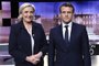 (FILES) In this file photo taken on May 3, 2017 French presidential election candidate for the far-right Front National (FN) party, Marine Le Pen (L) and French presidential election candidate for the En Marche ! movement, Emmanuel Macron pose prior to the start of a live brodcast face-to-face televised debate on the French public national television channel France 2, and French private channel TF1 in La Plaine-Saint-Denis, north of Paris, as part of the second round election campaign. - French President and La Republique en Marche (LREM) party candidate for re-election Emmanuel Macron will go head-to-head with French far-right party Rassemblement National (RN) presidential candidate Marine Le Pen late on April 20, 2022 in their only direct clash ahead of April 24s second-round vote, an encounter set to be watched by millions of French people. (Photo by Eric Feferberg / POOL / AFP) / ALTERNATIVE CROP<!-- NICAID(15072340) -->