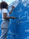 Inspirada na estampa, ela fez uma pintura artística em um muro na Rua Esmerilda da Silva Goulart, na Vila Elza