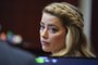Actor Amber Heard arrives for closing arguments in the Depp v. Heard trial at the Fairfax County Circuit Courthouse in Fairfax, Virginia, on May 27, 2022. - Actor Johnny Depp is suing ex-wife Amber Heard for libel after she wrote an op-ed piece in The Washington Post in 2018 referring to herself as a public figure representing domestic abuse. (Photo by Steve Helber / POOL / AFP)Editoria: CLJLocal: FairfaxIndexador: STEVE HELBERSecao: justice and rightsFonte: POOLFotógrafo: STR<!-- NICAID(15109178) -->
