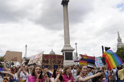 Members of the Lesbian, Gay, Bisexual and Transgender (LGBT+) community take part in the annual Pride Parade in the streets of Soho in London on July 2, 2022. (Photo by Niklas HALLEN / AFP)<!-- NICAID(15138540) -->