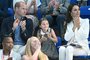 TOPSHOT - Britains Prince William, Duke of Cambridge (L) and Britains Catherine, Duchess of Cambridge (R) sit with their daughter Britains Princess Charlotte of Cambridge (C) as they watch the mens 1500m freestyle heats swimming event at the Sandwell Aquatics Centre, on day five of the Commonwealth Games in Birmingham, central England, on August 2, 2022. (Photo by Oli SCARFF / AFP)Editoria: SPOLocal: BirminghamIndexador: OLI SCARFFSecao: swimmingFonte: AFPFotógrafo: STR<!-- NICAID(15164367) -->