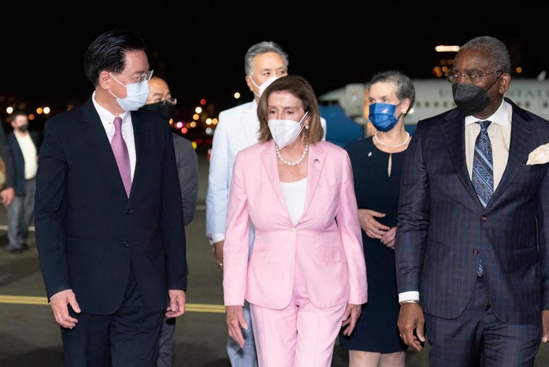 This handout picture taken and released by Taiwans Ministry of Foreign Affairs (MOFA) on August 2, 2022 shows Speaker of the US House of Representatives Nancy Pelosi being welcomed upon her arrival at Sungshan Airport in Taipei. (Photo by Handout / Taiwans Ministry of Foreign Affairs (MOFA) / AFP) / -----EDITORS NOTE --- RESTRICTED TO EDITORIAL USE - MANDATORY CREDIT AFP PHOTO / Ministry of Foreign Affairs - NO MARKETING - NO ADVERTISING CAMPAIGNS - DISTRIBUTED AS A SERVICE TO CLIENTS<!-- NICAID(15164731) -->