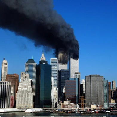 US-WORLD TRADE-DOWNTOWNThe twin towers of the World Trade Center billow smoke after hijacked airliners crashed into them early 11 September, 2001. The suspected terrorist attack has caused the collapsed of both towers.  AFP PHOTO/Henny Ray ABRAMS (Photo by HENNY RAY ABRAMS / AFP)Editoria: DISLocal: New YorkIndexador: HENNY RAY ABRAMSSecao: accident (general)Fonte: AFPFotógrafo: STR<!-- NICAID(14884214) -->