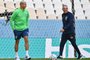 Brazils coach Tite (R) and Brazils forward Richarlison (L) walk on the field during a stadium familiarisation at the Lusail Stadium in Lusail, north of Doha, on November 21, 2022 during the Qatar 2022 World Cup football tournament. (Photo by NELSON ALMEIDA / AFP)<!-- NICAID(15272682) -->