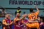 Netherlands defender #17 Daley Blind (C) celebrates with teammates after he scored his teams second goal during the Qatar 2022 World Cup round of 16 football match between the Netherlands and USA at Khalifa International Stadium in Doha on December 3, 2022. (Photo by Anne-Christine POUJOULAT / AFP)<!-- NICAID(15284829) -->
