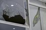 View of a broken window at Planalto Palace in Brasilia on January 9, 2023, a day after supporters of Brazils far-right ex-president Jair Bolsonaro invaded the Congress, presidential palace, and Supreme Court. - Brazilian security forces locked down the area around Congress, the presidential palace and the Supreme Court Monday, a day after supporters of ex-president Jair Bolsonaro stormed the seat of power in riots that triggered an international outcry. Hardline Bolsonaro supporters have been protesting outside army bases calling for a military intervention to stop Lula from taking power since his election win. (Photo by MAURO PIMENTEL / AFP)Editoria: WARLocal: BrasíliaIndexador: MAURO PIMENTELSecao: demonstrationFonte: AFPFotógrafo: STF<!-- NICAID(15316434) -->